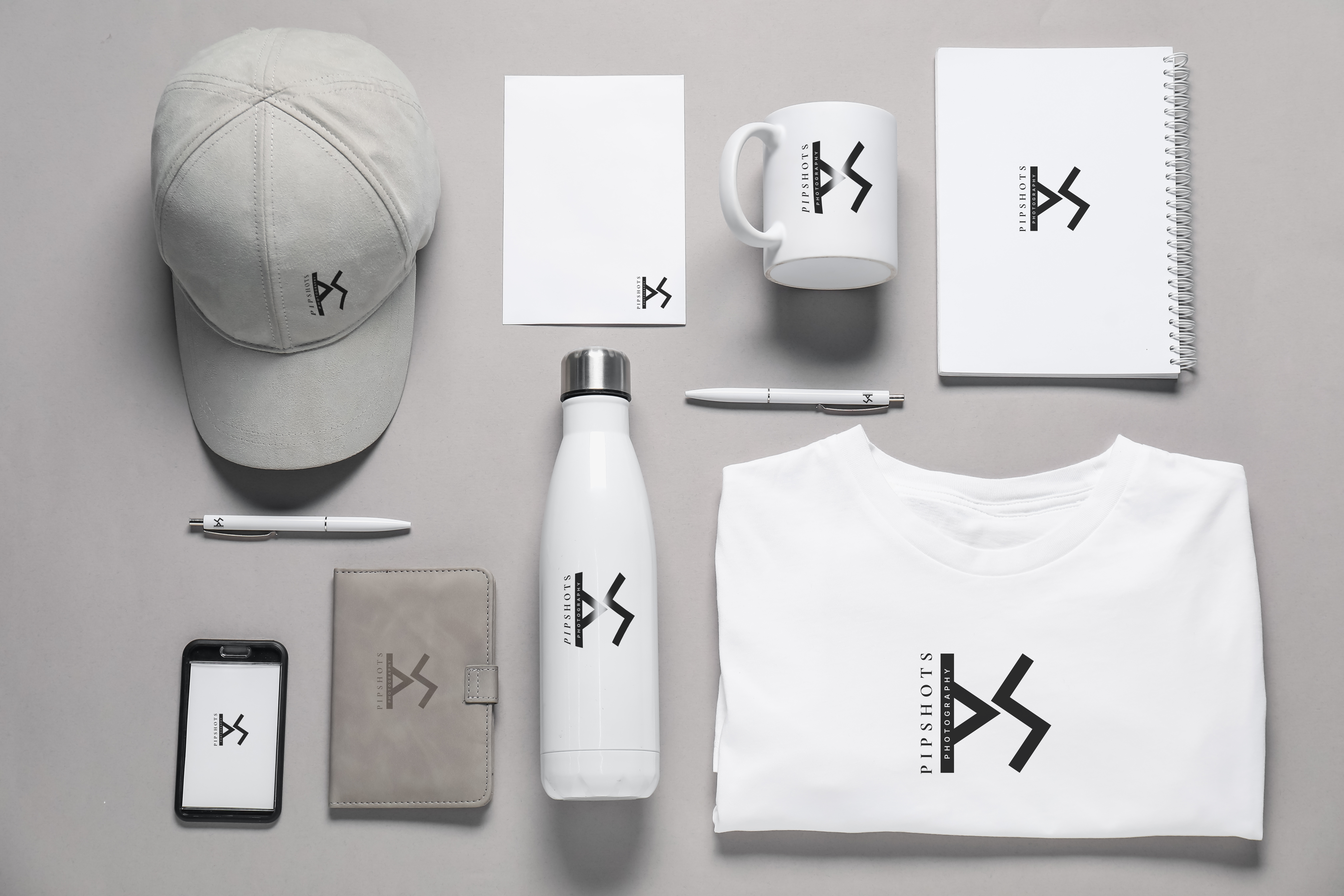 Pipshots brand identity applied across printed and digital materials