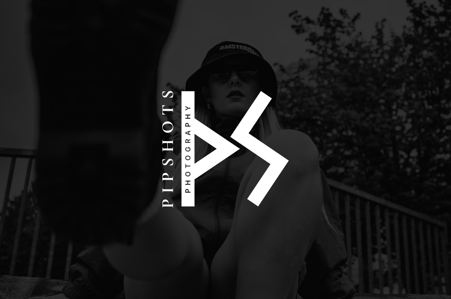 Pipshots wordmark and geometric brand symbol presented in black and white
